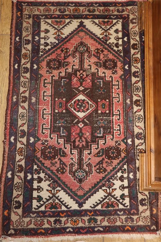 An Indian rug 125 x 78cm